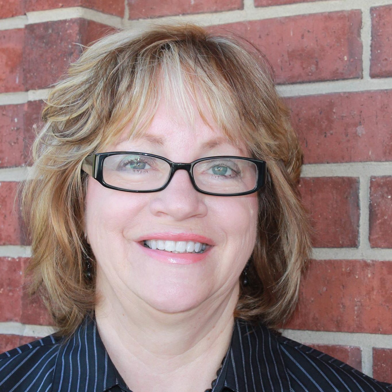 Susan Baumgart Headshot Susan Baumgart Headshot